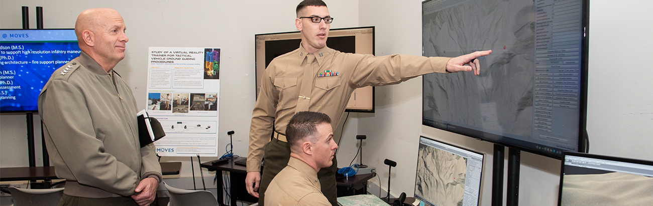 Capt Boron & Capt Garibay demonstrate their theses to Gen. Berger, CMC.